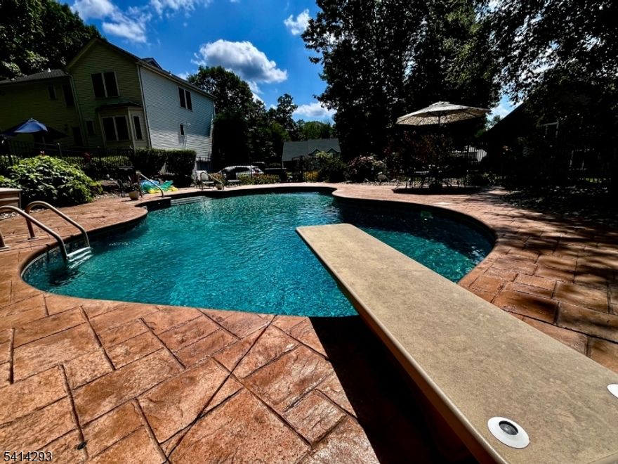 IMMACULATE 4-BEDROOM, 2,400 SQ FT COLONIAL WITH A FINISHED BASEMENT AND A GORGEOUS HEATED IN-GROUND POOL. THIS AMAZING HOME OFFERS AN OPEN, SPACIOUS FLOOR PLAN WITH ABUNDANT NATURAL LIGHT IN EVERY ROOM.THE FIRST FLOOR FEATURES A CUSTOM KITCHEN WITH CENTER ISLAND, STAINLESS STEEL APPLIANCES, PANTRY, AND A COZY BREAKFAST NOOK. A SPACIOUS FORMAL DINING ROOM, FAMILY ROOM, AND FORMAL LIVING ROOM COMPLETE THE MAIN LEVEL, ALL SHOWCASED BY BEAUTIFUL HARDWOOD FLOORING. UPSTAIRS, YOU'LL FIND A GENEROUS PRIMARY SUITE WITH A LARGE WALK-IN CLOSET AND A FULL EN-SUITE BATH, PLUS THREE ADDITIONAL NICELY SIZED BEDROOMS. HEAD DOWN TO THE LOWER LEVEL TO ENJOY A LARGE RECREATION ROOM/HOME OFFICE AND A LAUNDRY AREA IDEAL FOR FLEXIBLE LIVING. STEP OUT BACK TO YOUR PRIVATE RESORT LIKE REAR YARD FEATURING A STATELY STAMPED CONCRETE POOL SURROUND WITH A BEAUTIFUL PATIO AND ENCHANTING FIRE PIT FOR THOSE COOL FALL NIGHTS AS WELL AS A SHED FOR EXTRA STORAGE. BUILT IN 1995, THIS HOME IS PACKED WITH UPDATES: KITCHEN (2013), NEW PELLA WINDOWS AND SLIDER (2019), POOL HEATER (2021), POOL COVER (2024), CENTRAL AIR (2023), ROOF (2023), NATURAL GAS CONVERSION INCLUDING NEW FURNACE AND HOT WATER HEATER (2024), AND A NEW DRIVEWAY (2025). MOVE-IN READY IN A GREAT LOCATION, WALK TO THE GRAMMAR/MIDDLE SCHOOL AND ENJOY EASY ACCESS TO MAJOR ROUTES AND SHOPPING. HURRY, THIS ONE WILL NOT LAST!