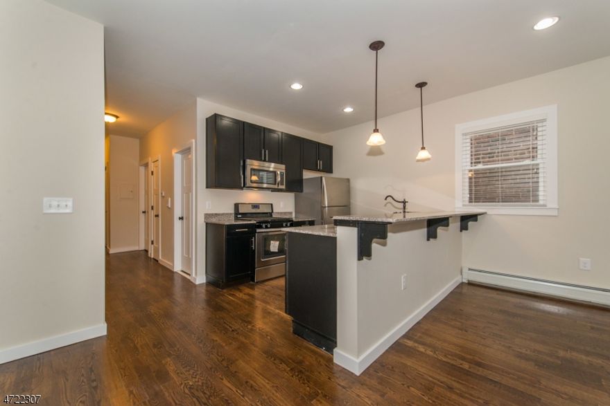 Charming 2 Bed 2 Bath apartment in heart of beautiful Madison. Beautifully exposed brick walls,hardwood floors,granite counter tops and stainless steel appliances. Master suite. Just steps away from NJ Transit trains.NTN generated from our office,credit check,income verification and tenant insurance required. Pet restrictions.One time fee applies.