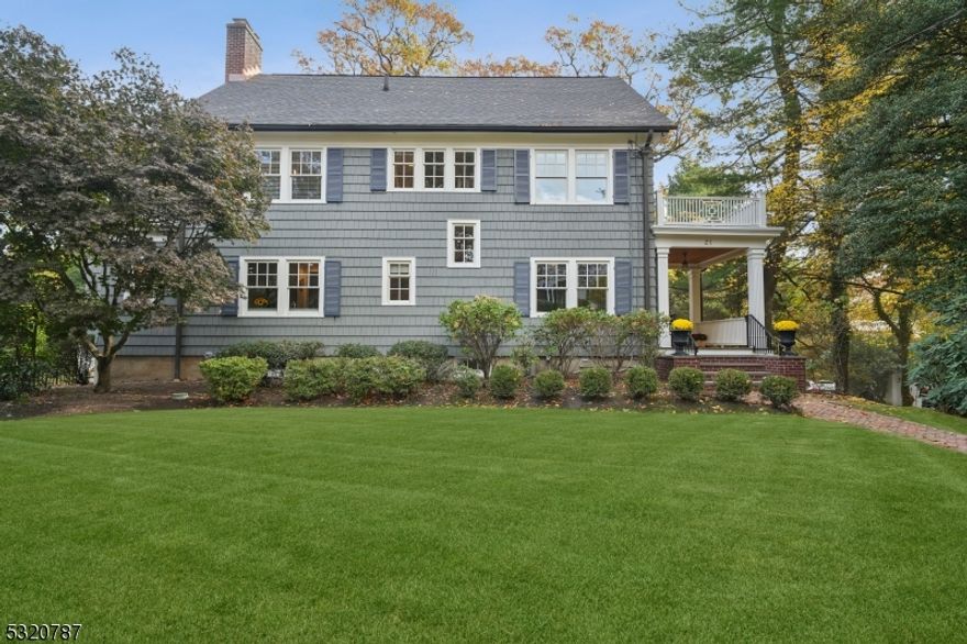 Discover the perfect blend of modern luxury and classic charm in this exquisitely renovated colonial. Set on a peaceful street in one of Summit's most desirable Northside neighborhoods, this home is within easy reach of town, accessible to shopping, dining and the train. Step inside to a gracious foyer that leads you into an updated eat-in kitchen, spacious living, dining, and family rooms, a half bath and a sunny mudroom providing convenient access to the back deck. Gather in the living room around the gorgeous gas fireplace, a beautiful focal point that marries contemporary convenience with timeless style. The second and third floors reveal five generous bedrooms and three full baths, including a luxurious primary suite complete with a walk-in closet, an en-suite bath, and a private office for ultimate relaxation. With fresh paint throughout the interior and exterior, along with a new roof (2024), this home is truly move-in ready. The lower level offers additional conveniences, including a half bath, a large laundry room, and ample storage space. Located within the sought-after Lincoln-Hubbard school district, this home has everything you need and more. Embrace the elegance and comfort you've been looking for-come experience it for yourself!