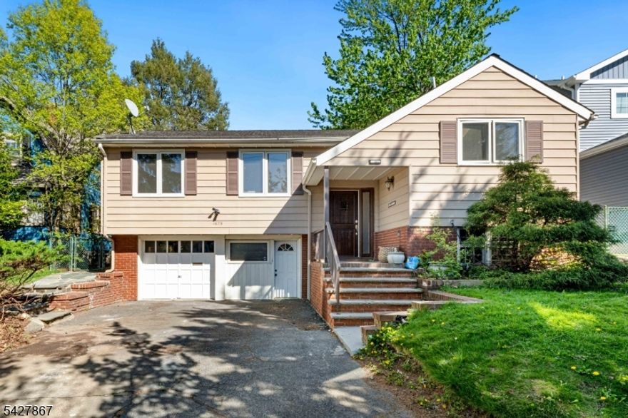 Welcome to 1675 Broad Street, a beautifully maintained 4 bedroom, 3 full bath single family home in the highly desirable Brookdale section of Bloomfield, right on the border of Montclair. This residence offers a rare combination of space, flexibility, and an unbeatable location.The main level features bright and airy living and dining areas filled with natural light, flowing into a renovated kitchen with stainless steel appliances and modern finishes. The primary suite offers two closets, an en suite full bath, and a skylight that fills the room with beautiful morning light. Two additional bedrooms and a shared full bath complete the upper level.The lower level offers additional finished living space with a full bath, laundry room, attached garage, and flexible bonus rooms ideal for a home office, guest space, recreation area, or extended living setup.Enjoy a private backyard ideal for entertaining or relaxing. Conveniently located near Brookdale Park, shopping, dining, major highways, and NJ Transit with easy access to New York City, this home offers the perfect balance of suburban comfort and commuter convenience.