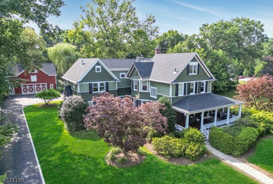Spectacular restored and expanded turn-of-the century Victorian sitting on one of Oradell's most desirable streets. This 9100 sf beauty (multiple floors) offers a unique experience with countless vignettes for any occasion. With 7 bedrooms, 7 baths, including a luxe primary suite, the timeless design balances modern living with old-world charm. The 1st floor guest suite rivals a Manhattan penthouse. The chef's kitchen opens to a cozy family room, outdoor living space with kitchen and stone fireplace perfect for al fresco dining! Work from home in the spectacular 2nd floor office with balcony. Movie nite in the Lower Level media room and family room with wine wall. The restored barn features a 2-1/2 car garage, a gym with soaring ceilings and reclaimed barn wood walls. Adjoined by 1.5 acres of passive parkland, impeccable landscaping with up-lighting and mature trees on a serene .67 acre lot. Oradell has a charming downtown, tree-lined streets, parks, classic architecture and the nearby train station for easy access to Manhattan. Truly perfect!