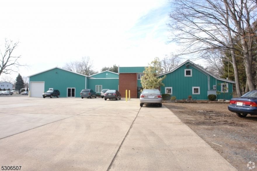 One acre fronting on State Highway 28 (Union Ave).  Approximately 11,000 SF of former wholesale florist business.   Currently Zoned RT (Residential Transition).  6 Overhead Doors plus one 12 Ft Overhead Door. Subject to municipal approvals.