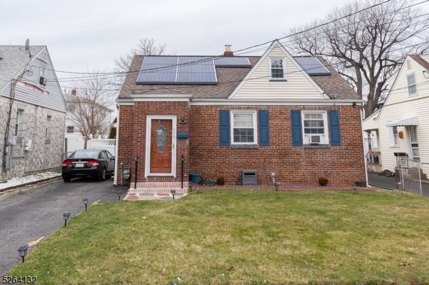 Welcome to this Lovely 3 Bedroom, 1.5 Bath Expanded Brick Front Cape in the Heart of Linden. Centrally located and convenient to all Linden has to offer this home is the perfect blend of charm & contemporary living with the added bonus of a partially finished basement, providing additional space for your lifestyle needs. As you step through the front door, you are greeted by a warm and inviting living space, highlighted by an abundance of natural light that fills the room. The three bedrooms provide comfortable retreats, each offering its unique charm. Adjacent to the dining room, the family room beckons with its own charm. French doors not only add a touch of sophistication but also creates a seamless connection to the well-maintained backyard which features new privacy fencing and storage shed(w/electric), providing a private oasis for outdoor activities, gardening, or simply unwinding after a long day. Brand New Boiler. Located in Linden, NJ, this home offers proximity to local amenities, schools, and parks. Enjoy the convenience of nearby shopping and restaurants, with easy access to transportation for commuting ease. Don't miss the opportunity to make this delightful Cape Cod residence your own.