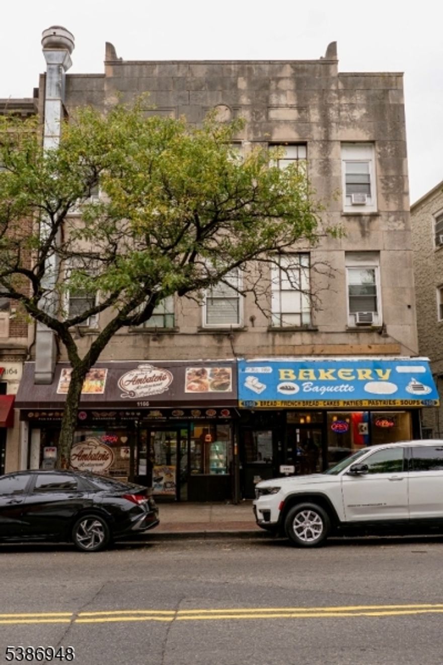 Prime investment opportunity! This 4-unit mixed-use building features two spacious 4-bedroom apartments and two established bakeries on the ground floor. Located in a designated Opportunity Zone, this property offers strong rental income potential, tax advantages, and long-term growth in a thriving area.