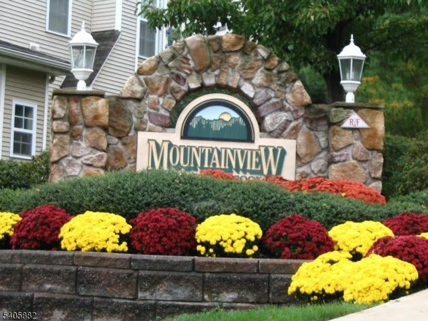 Welcome to this move-in ready, beautifully updated Green Brook townhouse offering comfort, style, and convenience. Freshly painted in neutral Benjamin Moore tones, it feels bright and inviting. The first level features elegant marble floors, a warm living room with gas fireplace, powder room, and laundry. The updated kitchen boasts granite countertops and SS- appliances. Upstairs are two spacious bedrooms and two full bathrooms. The primary suite includes a walk-in closet with built-in shelving and an en-suite bathroom with double vanity, soaking tub, and stall shower. The second bedroom is generously sized. The extra-large walk-out basement offers flexible space for a recreation room, media area, or potential third bedroom, plus a separate storage room. Recent updates include a new roof (2023) and a new hot water heater. What the owner loved...Outdoor Living & Parking: Enjoy your morning coffee on private patio. Parking with an extra-long one-car garage, two-car carport, and guest spaces. This unit is perfectly positioned in front of a community pool. Community & Location: Residents enjoy resort-style amenities like pool, tennis court, and scenic walkways. Located in the Blue-Ribbon Green Brook School District and Watchung Hills High School, with easy access to Route 22 and nearby commuter train stations. Commuter's Dream: Just minutes from the train station and major transportation hubs, commuting to Manhattan is simple and convenient. Don't miss the Video Tour provided!