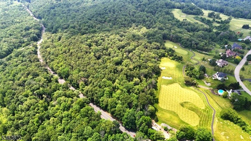 RARE OPPORTUNITY! 87+/- acre parcel - Perched at one of Sparta?s highest elevations, the property?s south-facing exposure maximizes natural light and offers stunning year-round views of a vibrant community known for its beauty and charm. Whether you envision a secluded dream estate, an exclusive high-end development, a picturesque wedding venue, or something unique, this exceptional property is a true blank canvas ready to bring your vision to life. With endless views of mountain ranges and Lake Mohawk, this is a rare opportunity for investors, land stewards, or nature enthusiasts alike. This property offers endless possibilities in a prime location. Bordering SkyView Golf Club, enjoy the luxury of stepping onto the green whenever you desire. The land's serene setting is perfect for creating your oasis, surrounded by natural beauty and sophisticated living. Sparta is more than a location; it's a lifestyle. Just 50 miles from Times Square, this picturesque town blends suburban tranquility with modern conveniences. From boutique shops and cozy cafes to year-round festivals and a thriving farmers' market, Sparta delivers an unmatched community experience. Highly rated schools, welcoming neighborhoods, and a strong sense of safety make Sparta ideal for private builders, investors, and visionaries alike. Seize this extraordinary opportunity to secure a piece of Sparta's future today!