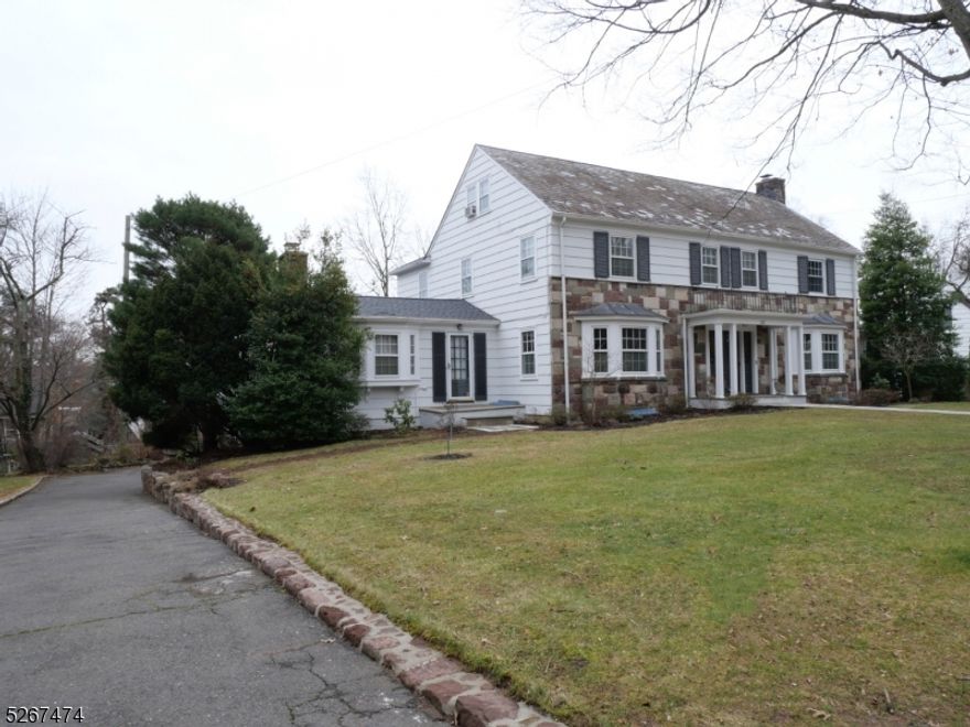 This Grand Colonial home sitting in the heart of Maplewood, offers a stunning 5 bed/5.1 bath situated in a prime location convenient to shops, restaurants, parks, and trains to NYC. Greeted by a grand entry foyer, inside you'll discover original chestnut woodwork and spacious rooms. The first floor boasts an elegant living room with an ornate wood burning fireplace, a family room with another wood burning fireplace, large formal dining room, kitchen with a separate breakfast room leading to an outside terrace for outdoor enjoyment, a large sunroom with sliding doors leading to a large deck overlooking the garden like grounds. The second floor features three bedrooms and baths. The third floor with two additional bedrooms and baths. Hardwood Floors throughout the whole house. The walkout basement is elegantly finished and full of sunlight, bedroom in basement is used as 6th bedroom, walkout to a private garden like backyard for your relaxation. This is a must see to be appreciated.