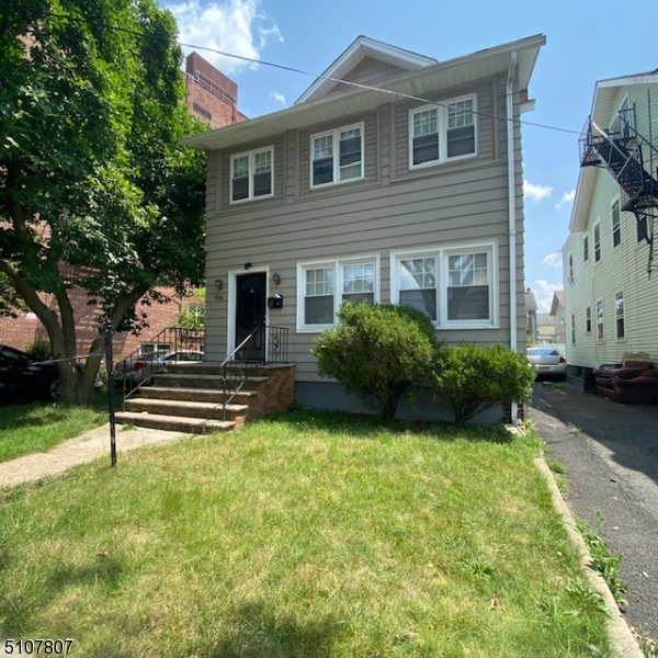 Bright and spacious, this well-maintained second-floor unit offers 4 generously sized bedrooms with ample closet space. Fully renovated in 2018, the apartment features modern finishes, including stainless steel appliances, granite countertops, and a freshly painted interior. The bathroom has just been beautifully renovated, adding to the unit's appeal. Residents enjoy shared access to a yard, perfect for outdoor relaxation. Conveniently located just a few blocks from the Maplewood border, this apartment is within walking distance of NYC bus stops and minutes from major highways, including Route 78, the Garden State Parkway, and Route 22.