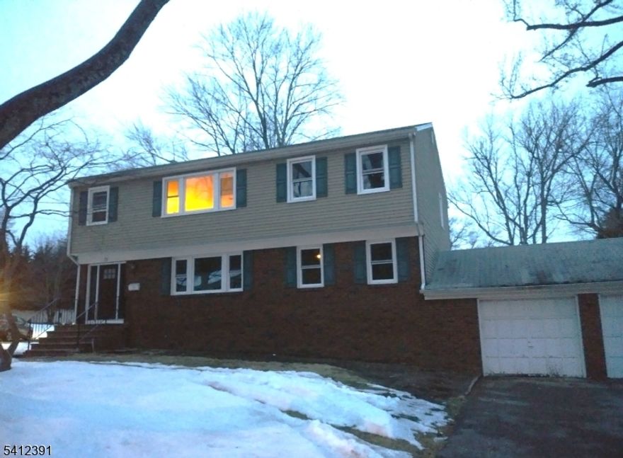 This is a completely redone, very spacious, quality 1st flr apartment! Offers a new eat-in kitchen w/shaker cabinets, quartz counter, tile backsplash and stainless applncs. New bath has a 48" vanity, walk-in tiled shower. and 2 linen closets. The entire interior has been freshly painted and hardwood flrs refinished. Overhead lighting in all rooms...recessed in the living rm & kitchen. All new windows and quality solid wood interior doors. All good-sized rooms and closets. Also C/A/C! This is a top-notch apartment redone by a quality builder. Basement has inside access and offers separate laundry hook-ups, an additional closet, private storage rm; and half bath for convenience. Also includes 1 garage bay; and shared use of the yard & double width driveway w/2 spaces each. Located on a quiet side street in a great town with great schools and is convenient to virtually anything you could possibly need. Lease application, credit report, proof of income, insurance, first $150 ea repair responsibility of tenant. Landlord maintains landscape. Tenants handle snow. Pets condsidered on a case-by case basis. No smoking or vaping in the house or garage.