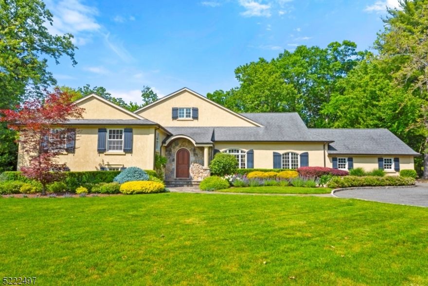 Nestled on almost an acre in prestigious Coventry, this meticulously maintained, highly energy-efficient home is compelling with reasonable taxes. Immerse yourself in luxury with exquisite finishes and custom-built design. Upon arrival, you'll be greeted by a grand arched doorway, high ceilings, and an open floor plan that seamlessly combines elegance and functionality. The main level of the house features a dramatic great room adorned with a classic fireplace, oversized formal dining room, and an inviting living room, perfect for entertaining guests. The Expansive gourmet kitchen is a chef's haven. A spacious first-floor office provides flexibility to convert it into a 5th bedroom. Each room on the bedroom level is exceptional, with the primary suite serving as a luxurious and serene retreat. Complete with a sitting area, walk-in closets, and a spa-like en-suite bathroom boasting a soaking tub and an oversized walk-in shower, it's designed to enhance your everyday living experience. The grounds surrounding this property are a resort-like tranquil oasis. A sparkling 20 x 40 pool is complemented by a spa and poolhouse with outdoor shower, perfect for enjoying warm summer days and creating lasting memories. For additional relaxation and entertainment, the finished lower level offers a large recreation room and a full bathroom. This home is truly a gem, with its thoughtful layout and architectural charm.