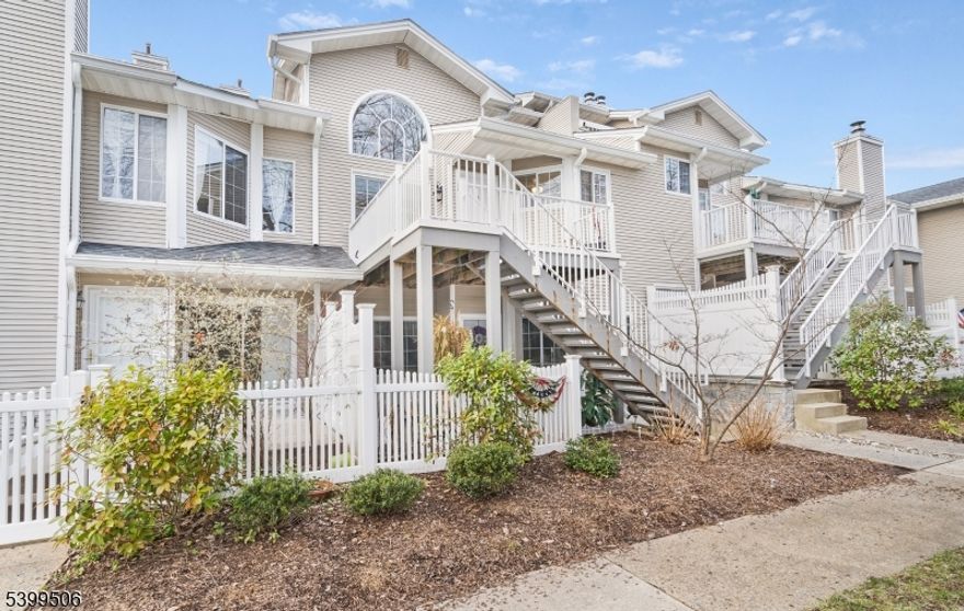 Welcome to 28 Bentley Court in the desirable Crestmont Village section of The Hills! This fully furnished 2-bedroom, 2-full-bath Townhouse features a private front deck, an inviting living room with soaring ceilings, a cozy wood-burning fireplace, and stylish laminate flooring. The spacious dining area opens to a beautifully updated galley kitchen offering white shaker cabinetry, granite countertops, subway tile backsplash, and stainless-steel appliances. Additionally, there is a first floor bedroom and updated full bath. Upstairs, a generous loft provides ideal flex space for a home office or den and leads to the king-sized primary suite with vaulted ceiling, walk-in closet, laundry closet with a full size washer & dryer, and sliders to a second private balcony. The ensuite bath boasts a double-sink vanity and stall shower. The condo also has an attached ground-level 1 car garage with direct interior access via a private staircase into the unit.  Residents also can enjoy The Hills amenities outdoor association pool, clubhouse, tennis courts, playgrounds, and walking paths. The neighborhood is also conveniently located near shopping, dining, major highways, and NYC commuter options. This rental won't last for long!