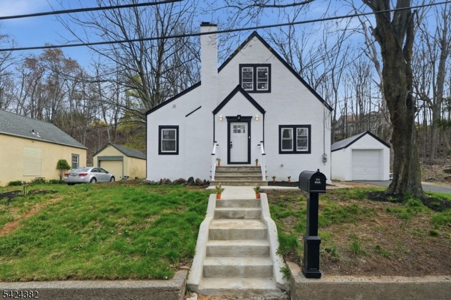 Wow, one of the most beautiful homes currently on the Wayne market, full of character and located on a quiet dead end street offering great privacy. This fully renovated property was done with care and attention to detail, featuring 3 bedrooms plus an office or den, 2 full bathrooms, including a primary bedroom suite, and everything today's buyer is looking for. The kitchen has been completely updated with quartz countertops, two tone cabinetry, high end appliances, and a double door refrigerator. The home also offers a large basement with endless potential, a detached garage, and parking for up to 4 cars. Equipped with central AC and forced hot air, and set in a nearly unbeatable location, this is a home you need to see in person.