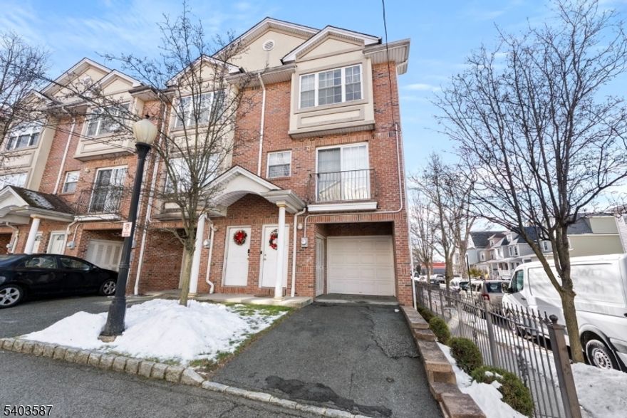 Welcome to 126 Amherst Street, a meticulously maintained end-unit townhome in East Orange offering a flexible and well-designed layout across three levels. The ground floor features a garage and a spacious family room, perfect for entertaining or relaxing. The first floor offers a bright living room/dining room combo, a full bath, and a third bedroom. The second floor includes two generously sized bedrooms, a full bath, an office/loft area, and a master bedroom with a walk-in closet. The home features wood flooring throughout the main living areas and staircase, central air, in-home laundry, and a private lower-level entertaining space. Conveniently located within half a mile of NJ Transit's East Orange Train Station and close to major highways, shopping, and everyday amenities. This is a short sale and is being sold strictly as-is. Buyer is responsible for Smoke/CO certification.