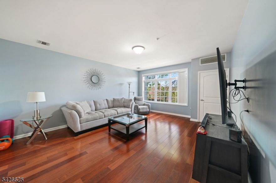 Welcome to The Parkline Condominium!  This beautifully maintained interior unit offers one of the largest layouts in the building.  This unit offers 2 bedrooms and 2 full bathrooms.  The spacious primary suite includes a walk-in closet and a large en-suite bath.Building amenities include a dramatic two-story foyer, two elevators, fitness center, security cameras, event room, private storage, one assigned parking space, and guest parking. Commuters' dream-located just two blocks from NJ Transit with an easy 35-minute commute to NYC. Must see it!!