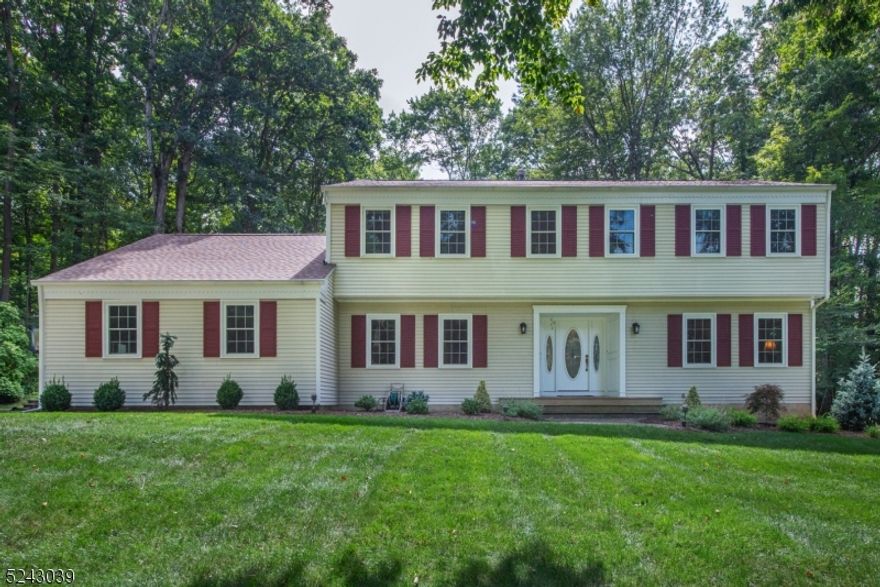 Exceptional Shongum Lake Colonial with Beautiful Expanded & Updated Kitchen, featuring cherry custom cabinetry, granite countertops, high-end SS appliances including warming drawer, & Large Pantry! A convenient mud room off the kitchen. A patio ideal for entertaining overlooking the flat & wooded backyard! A private office on the main floor. This home offers a spacious open floor plan, large sized rooms and closets, Updated Baths, flat property, in one of Shongum Lake's desirable quiet side streets.  New Roof in 2020 & Windows in 2021. Two Zone Heat & AC. Hardwood Floors under carpets. Attic space over the garage accessible through walk-in closet in bedroom 2. This is a One of a Kind home, don't miss it! The Shongum Lake Community features a clubhouse, beach, boating, swimming, and a full calendar of social events. Public utilities. Award Winning Randolph Schools. Close to highways and public transportation. Sq Footage per tax record.