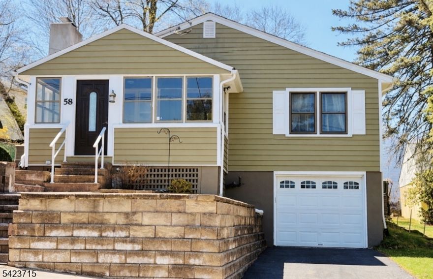 Beautiful ranch located in Dover, NJ. This well-maintained home features a welcoming front porch, hardwood floors throughout, and 3 generously sized bedrooms, all conveniently located on one level. The property offers 2 full bathrooms and a finished basement, ideal for recreation, entertainment, or additional living space. Enjoy outdoor living with a private patio and fenced-in yard. Conveniently located near downtown Dover, schools, shopping, and major routes.Additional updates include newer siding, roof and central air unit.