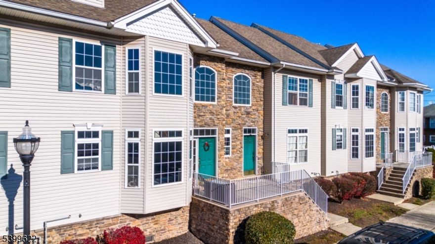 YOUR SEARCH ENDS HERE! Welcome to your commuter's retnal! This beautiful two-story home is just minutes away from Newark, New York, and points south. You'll love the hardwood floors throughout and the eat-in kitchen featuring stainless steel appliances, granite countertops, and wood cabinetry. Huge great room or entertain guests in the formal dining room. Upstairs you'll find a luxurious master suite with a walk-in closet and master bath plus an additional bedroom, full bath, den/office space! To top it off there are two assigned parking spaces included for your convenience. Don't miss this opportunity to live life close to all of the action.