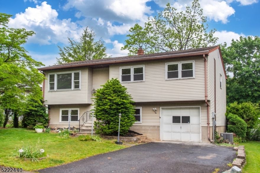 Pet friendly. Just renovated in 2023! New flooring and freshly painted throughout. Bi-Level home on quiet Cul-de-Sac in the Lake Hiawatha section of Parsippany. Lots of Generous Room Sizes to Spread Out & Make Your Own! Great living space. Open living and dining. Updated kitchen and 2 full bathrooms. Brand new windows! 3 large bedrooms & full bath upstairs. The ground floor boasts a large family room, the office/4th bedroom and 2nd full bath. Sliding doors lead into the level, spacious backyard, and access to a large garage. Laundry Room with washer & dryer. Plenty of storage space in the attic & garage. Easy access to major highways and NYC Mass Transportation. This home is minutes from Rt. 80, Rt. 46, Rt. 280 and Rt. 287. Great schools. Great house, great location, great lifestyle.