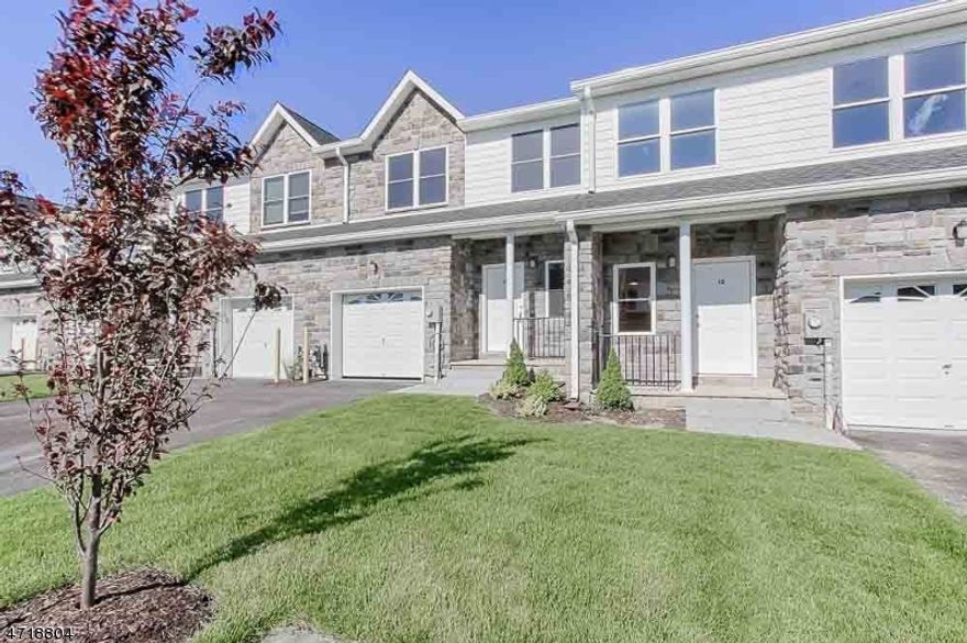 Beautiful 3 Bedroom Townhome in the well sought out development of Forge Pond in Parsippany-Troy Hills.  Bright and spacious with large rooms, open floor plan and extras GALORE!  Upgrades in Kitchen include granite counters, hardwood floors and recessed ceiling lights; stainless steel appliances.  Sliding glass doors give way to a spacious outdoor deck overlooking a private wooded lot.  Hardwood flooring throughout second floor with recessed ceiling lights in all bedrooms.  Generous sized Master Bedroom with a walk-in closet and Master Bathroom. Full unfinished walk-out basement withy laundry and plenty of storage.  1 car garage with garage door opener and driveway.  Plenty of visitor parking throughout the development.  Prime location, close to major highways 80, 287 and Route 10.  Tenant pays 1 month Broker Fee, 1.5 month Security Deposit and 1 month Rent prior to occupancy.