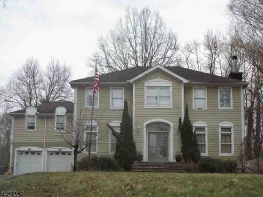 Located in the suburban community of West Caldwell, this Colonial-style single-familyresidence presents a compelling value-add opportunity for investors, contractors, orend users prepared to renovate. The property, built circa 2000, offers approximately3,962 square feet of gross living area, featuring 10 total rooms, 5 bedrooms, and 2.5bathrooms, situated on a generous 20,094 sq. ft. lot. Additional highlights include atwo-car attached garage and traditional Colonial layout. The home is situated alongPassaic Avenue, a main thoroughfare providing convenient access to local schools,parks, houses of worship, commercial amenities, and regional commuting routes.