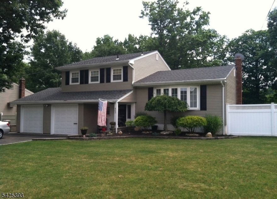 Move in ready and in a charming neighborhood, what more could you ask for? This beautiful split level has been meticulously maintained and well-loved offering ample space and multiple levels of living. Boasting 3 large bedrooms, 1 1/2 baths that have been fully redone with shiplap and stone accents throughout. Enter the front door into a bright and airy entry way just off the dining room and formal living room. First level includes the living room, kitchen, dining room and powder room that has been completely renovated. Head upstairs to the 3 bedrooms and main bath that has been completely renovated as well. Head downstairs to the finished basement and the separate family room featuring a stunning stone accent wall with beautiful Italian tile floors and a slider that takes you to the extra-large, fenced in backyard with concrete patio and metal pergola, perfect for entertaining or creating a backyard oasis. Also, downstairs is the entrance to the attached, oversized 3 car garage. Stay comfortable year-round with NEW CENTRAL A/C and HVAC systems! New roof and gutters and leaf guards recently installed as well as a new sump pump/water. Public sewer and water and excellent public schools, just a short drive to Valley Road Elementary. Enjoy all of the local amenities, restaurants and shops within minutes, including Rahway Park Jacksons Pond which provides access to the ponds, hiking, parks, etc. Ideal for commuters, 30 minutes to the city and a short drive to the train station.