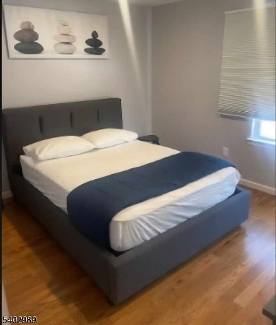 Welcome to 201 Schuyler Ave, Unit 1 in Newark. Built in 2021, this beautifully maintained and newly repainted apartment comes with all the bells and whistles of modern living.  The open concept is complemented by hardwood and tile flooring, central air and forced air heating for year-round comfort. The spacious apartment features 3 large bedrooms and 2 full bathrooms. The modern kitchen is fully equipped with upgraded appliances including a dishwasher, stove, microwave, and refrigerator.Located near Beth Israel Hospital, this property offers easy access to public transportation, major highways and shopping.