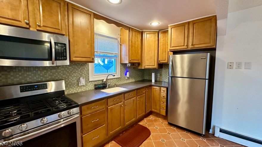 Charming single-family rental in desirable Roselle Park location. This well-maintained home features comfortable one-floor living with spacious rooms and plenty of natural light. The property includes a large lot,  and outdoor space ideal for everyday living. Equipped with ductless cooling for added comfort. Conveniently located near major highways, public transportation, shopping, and schools.