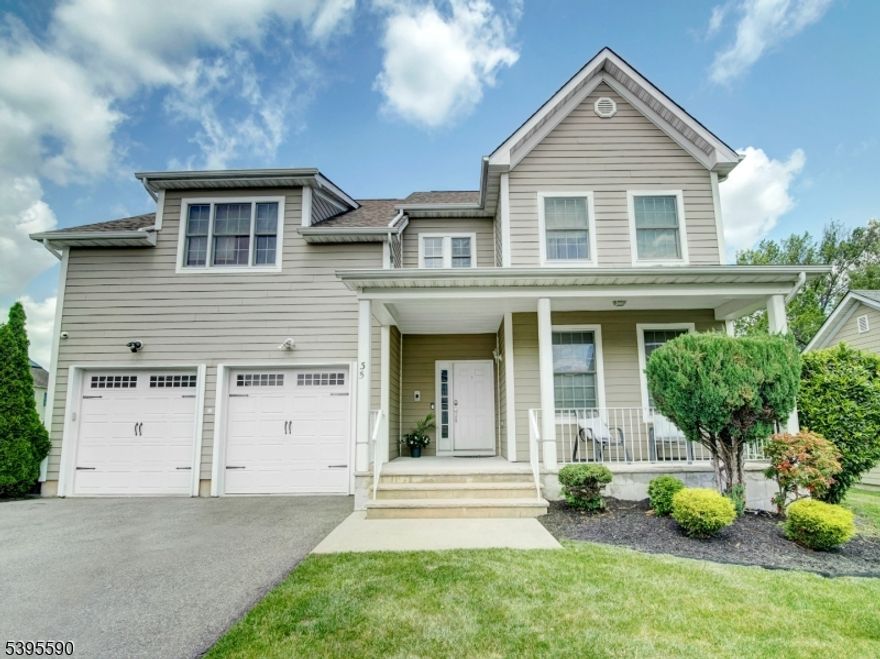 This stately 4-bedroom, Colonial is approximately 3,200 sq ft and offers refined living in a serene neighborhood. The entrance foyer of the Yale model showcases soaring ceilings, natural light and vibrant hardwood floors. The formal living and dining rooms flow seamlessly into the kitchen, featuring stainless steel appliances, custom cabinetry, and generous counter space. The kitchen sliders transition to an expansive deck and a deep running backyard full of lush grass; perfect for gatherings and outdoor enjoyment. The private primary suite is thoughtfully set apart from the three other bedrooms, enhancing privacy. A full, unfinished basement provides endless potential for customization. Additional highlights include a grand family room with a wood-burning fireplace, a two-car garage, attic storage, dual-zone cooling, and more. Enjoy full sunsets from the rear deck and the city fireworks from the front porch. Streamlined access to NYC via nearby highways and public transit. This Community awaits you!