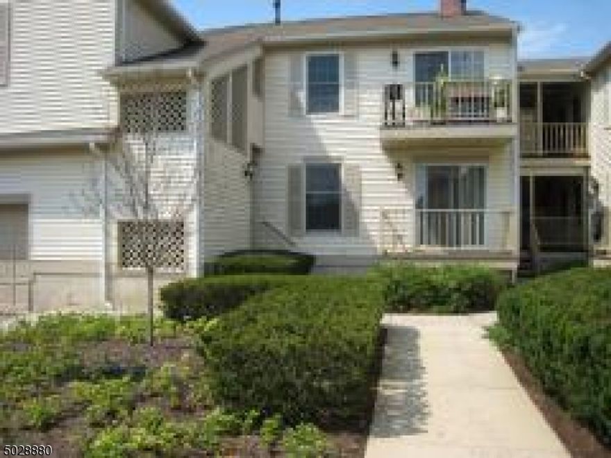 2 Bedroom, 2 Bath first floor Essex Model with large storage area in basement and one car garage. Updated appliances, laminate flooring, easy access, balcony off Living Room with great southern exposure, an eat-in kitchen and adequate closet space are featured.  Top rated schools, proximity to shopping and excellent commuting access to 78 & 287 are additional benefits of this unit.