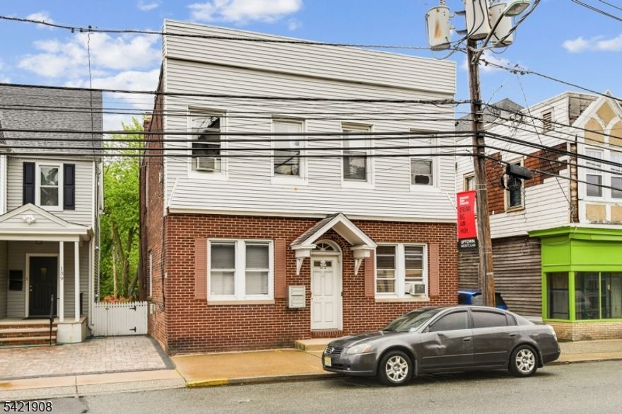 Spacious 4-unit investment property in a fabulous location. Well maintained, updated apartments. All 4 one-bedroom units are occupied. Close to shopping, restaurants, NYC transportation. Separate utilities. Tenants pay heat, hot water, electric, water, sewer. Photos are from previous listing.