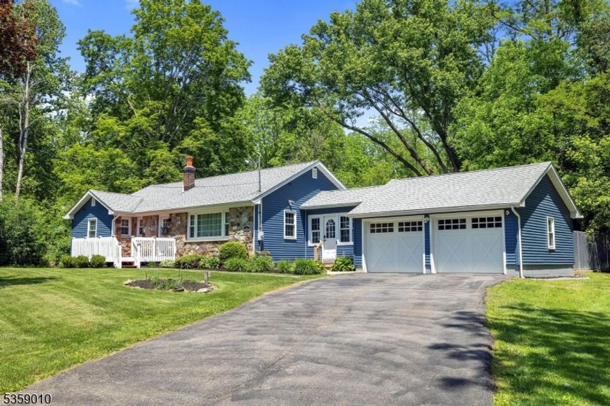 Completely move-in ready and thoughtfully updated, this 3-bedroom, 2-bath ranch offers modern living in a quiet, private setting on a spacious, level lot. Located in a top-rated school district, the home blends comfort, style, and everyday convenience.Renovated with care and attention to detail, the home features a bright, open-concept layout, updated finishes, and a fresh, contemporary feel throughout. The kitchen and baths have been tastefully modernized, and every space reflects pride of ownership. The finished basement is an entertainer's dream complete with a built-in beverage center and countertop, ideal for hosting game day, movie night, or your favorite reality show binge.Step outside to an expansive fenced in backyard perfect for pets, play, and gatherings with a brand-new play set and plenty of room to relax or entertain. The 2-car attached garage, central A/C, and ample storage make life easy.All this in a peaceful, private property just minutes from restaurants, shopping & grocery stores. Whether you're hosting friends or enjoying a quiet night in, this home is the perfect place to unwind, entertain, and enjoy. There's nothing to do but unpack & move in! Long Valley schools. Garage refrigerator and generator in garage stay; Port Murray 07865 mailing address.