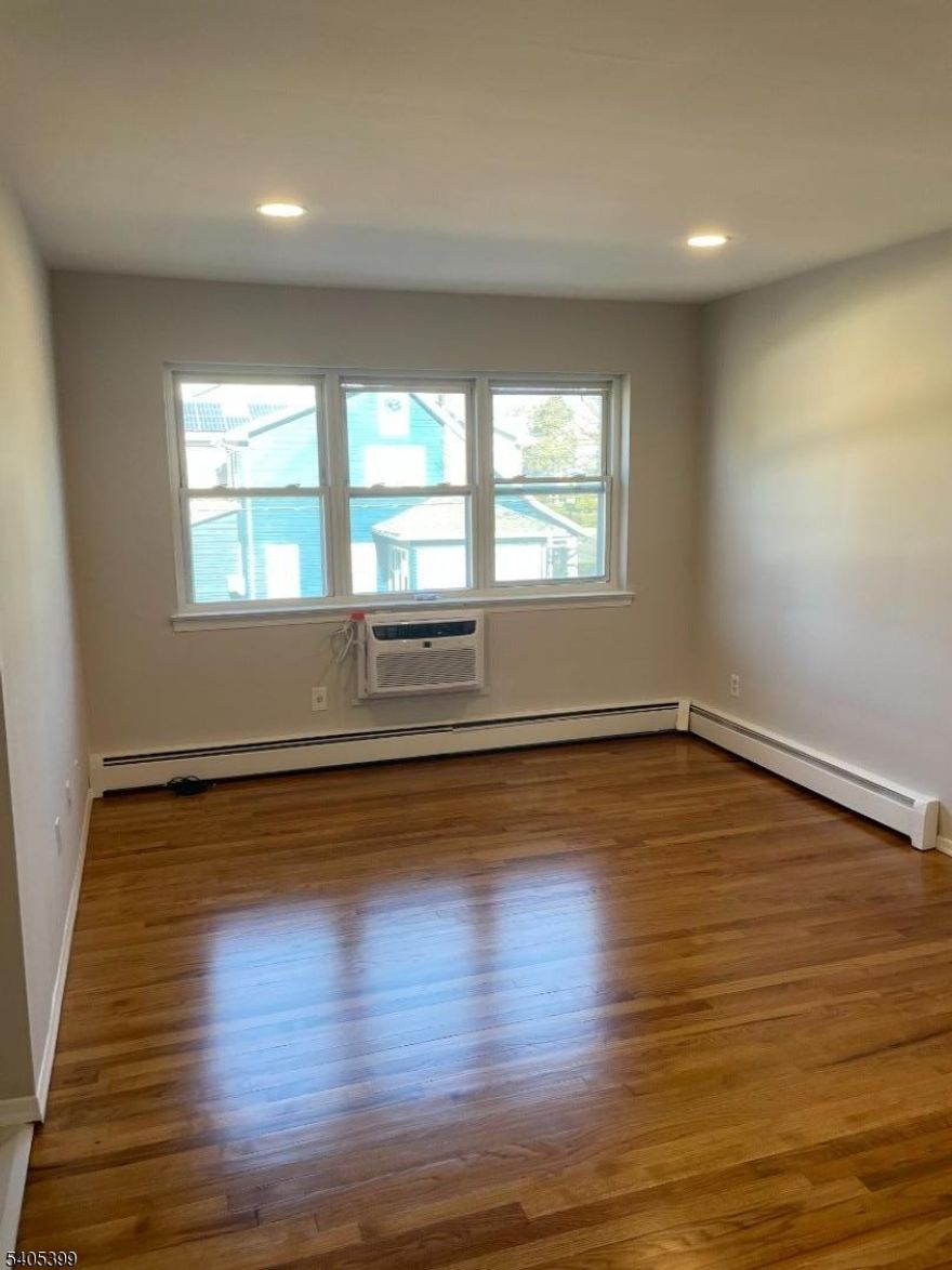 Spacious apartment just renovated features new kitchen, ss appliances, dishwasher, refrigerator, stove and microwave; brand new white tile bathroom, high hats, refinished wood floors, and plenty of closet space. This space is in an excellent location and in close proximity to path, bus, shopping, restaurants, and major highways. Heat/gas and hot water included in rent, Laundry on premises, off-street parking available. Docuverus Tenant Application required. No pets please