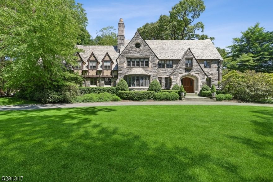 Pristine perfection is what you will find as you tour this truly lovely Estate Section manor home privately set on a corner property of over an acre.  Strikingly beautiful welcoming foyer with a dramatic circular staircase, sunken living room with fireplace, heated sunporch/family room, handsome office with built-in bookcases, gracious formal dining room & renovated kitchen & pantry on the first floor.  Lavish primary suite with newer bathroom & luxurious sitting room/walk-in closet.  Four more bedrooms & four more baths on the second floor plus laundry & a gym.  Sixth bedroom plus storage on the third floor.  Expansive lower level with fun rec room & bathroom. A sparkling inground pool with a diving board highlights the beautifully landscaped backyard with a patio & firepit.  Designed in 1929 by internationally renowned CC Wendehack best known for his creation of the Winged Foot Country Club & others.  Three-car heated, attached garage.  A very special home indeed!