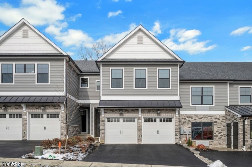 Rare to find new construction rental place. New construction luxury living townhome in"The Meadows" in a new neighborhood of townhomes. Great Schools. This 3 Bedroom, 2.5 Bath "Emory" unit has a 2 car garage with Electric charger, open floor plan, high ceilings, luxury features, flooded with natural light and a finished walkout high ceiling basement. A commuter's dream - close to shoppings. This luxurious townhome features a red spacious floor planning and equipped with a wide array of luxury living upgrades, including contemporary kitchen with granite countertops, big island, modern stainless-steel appliances of Range oven, Dishwasher, Refrigerator and Microwave. Main floor has open floor concept with solid oak hardwood flooring, Living room, Kitchen, Powder room, Dining area that opens to a spacious Deck. Master Suite with trayed 9' ceiling and has a generous walk-in closet, Master bath with dual sink Vanity, granite countertops, and a large shower with frameless shower door. Other 2 bedrooms with 9' ceilings with a common full bath and shower/tub, dual sink vanity, granite countertops, Laundry room is situated on second floor. Finished walkout basement offers a huge, clear-span finished area, with 9' ceilings and LVF flooring, can accommodate a multitude of uses, including great room, and walks out to the backyard with patio. NJ transit buses & trains, major highways Route 80, Route 46, Route 10 & Route 287. Approx. 30 miles away from New York.