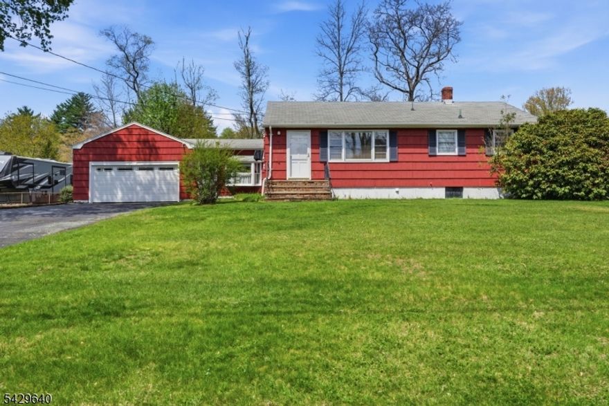 Opportunity knocks at 49 Heather Hills Drive in desirable Oak Ridge! This 3 bedroom ranch is set on a beautiful level half acre lot and is ready for its next owner to bring their vision and make it their own. Offering a classic single-level layout, this home features a spacious living area and a unique oversized den/breezeway that adds incredible versatility. Complete with a slate floor, this standout space is perfect for a family room or creating an entertaining area with easy access to the main home and garage. The property also features a large 2-car garage ideal for storage, workspace, or hobby use, along with a generous driveway providing off-street parking for 4-6 cars.While the home is dated, it presents a fantastic opportunity to update & customize to your taste all while enjoying the benefits of a solid layout and expansive outdoor space. The flat half-acre lot offers endless potential for outdoor living, gardening or expansion. Conveniently located near shopping, restaurants, places of worship and major highways. Bring your ideas and unlock the full potential of this well located ranch. 49 Heather Hills Drive is ready for its next chapter.