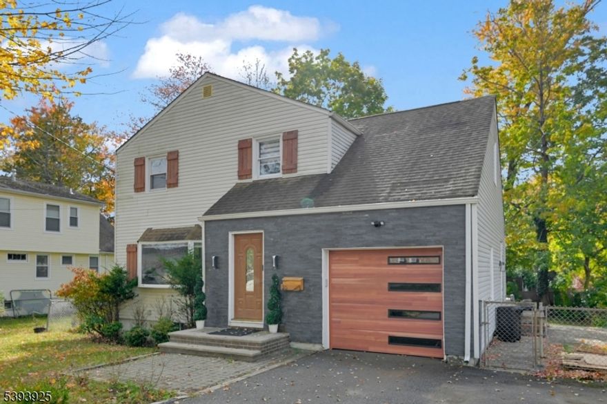 Beautifully Designed 3-Bedroom, 3.5-Bath Home in the Heart of Livingston! Welcome to 35 Grand Terr, a stunning 3-level home offering thoughtfully designed living space on a flat lot. The inviting open-concept main floor features a bright living room with an elegant fireplace, spacious dining area, and a modern kitchen with a center island perfect for entertaining and gatherings. Enjoy direct access to a large patio, ideal for outdoor dining, relaxation, and year-round entertaining. A powder room and convenient garage access complete this level.Upstairs, the primary suite provides a peaceful retreat with generous closet space. Two additional bedrooms, a full hall bath, and a laundry area add functionality and comfort to this well-designed floor. The finished lower level offers exceptional versatility with a spacious recreation room, wet bar, full bath, and utility area ideal for a home gym, media room, or guest suite.Additional highlights include an attached garage, ample storage, and a flat, usable yard perfect for play or entertaining. Conveniently located near top-rated Livingston schools, NYC transportation, shopping, and parks, this 3-bed, 3.5-bath home blends modern living with suburban charm.