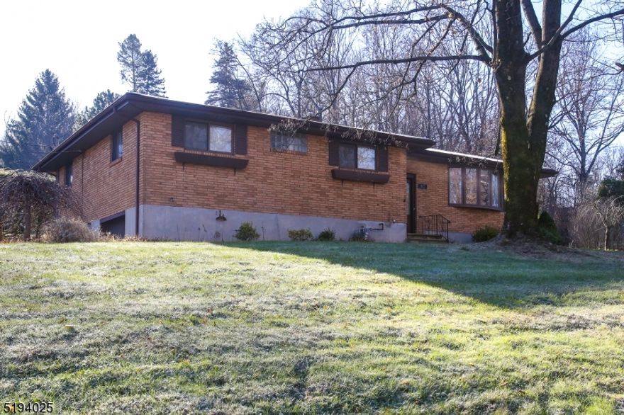 Great opportunity to purchase this large 4 bedroom, 2 1/2 bath brick Ranch.  Formal dining area, large eat in kitchen, hardwood flooring under carpeting, full basement, natural gas with a newer heating system, central air, plenty of parking, nice frontage, Charter elementary school, Canfield Avenue School, close to restaurants, shopping & all major routes, 80, 46, 10, only 45 minutes to New York City by car. House is being sold "AS Is."