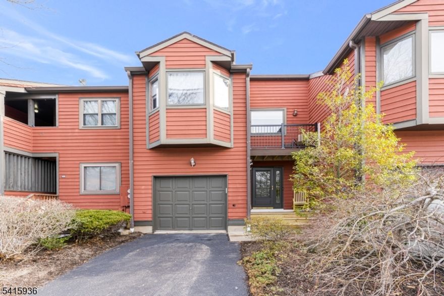 Impeccably updated 2-bed, 2.1bath home in South Main Village move-in ready and filled with light. A covered front portico opens to a welcoming foyer with newer LVP floors that continue throughout the first floor. The spacious dining area flows into a bright living room with wood fireplace and abundant windows. The updated kitchen features a tile backsplash, pantry, and a charming breakfast nook. This level also includes an updated powder room and direct access to the garage.Upstairs offers a loft ideal for a home office. The primary suite at the rear of the home includes two walk-in closets, an en-suite bath with stall shower, and a private balcony overlooking the backyard. The second bedroom also has generous closet space, an en-suite bath with tub/shower, and its own balcony.The full basement provides laundry and utility space, and ample storage. Outdoors, a private deck off the living room provides a tranquil retreat. Many updates throughout.Conveniently located near Flemington's dining and shopping and close to Routes 202, 12, and 31. Little more detail to the HOA:  Snow Removal, Garbage, Playground, Lawn Care, Pest Control, Exterior - Siding & Roof, New Balconies & Front & Rear Porch completed Feb. 2026. Exterior Paint coming Spring 2026.