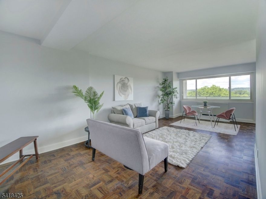 Come Home to another wonderfully done gut renovated 8th floor unit . This one is a 2 bedroom, 2 bath COOP and is for owner occupancy only. This West facing unit was just completed. This 8I unit sits  in the popular high rise Harrison Park Towers and has a gorgeous new kitchen with high end appliances, new bath, generous sized  and well lit bedrooms, and beautiful  wood floors. This well known Coop features a 24 concierge, included utilities (electric, heat, hot water), underground parking ($60/mo) - just 1 space available, complimentary jitney to the NYC train and grocery stores, a backyard mature "secret garden", first floor gym and bright, clean basement laundry. Just blocks from access to GSP and Route 280, this is one of the best buys in Essex County! Coop board approval required and 20% down payment is a requirement.   Ownership shares - 355. Monthly maintenance $1618. HOA includes taxes, maintenance and all utilities (heat/AC, hot water, electric).  See details on entrance requirements and move-in fees (low closing costs). Sq footage is approximate.