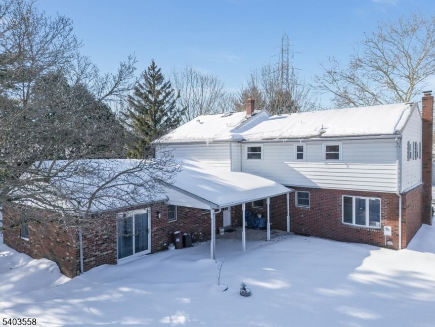 A TRULY RARE FIND, LIKE TWO COMPLETELY SEPARATE HOUSES IN ONE! THIS TOTALLY LEGAL  3716 SQ FT 6BR & 4.2 BATH FULL BRICK MOTHER/DAUGHTER COLONIAL IS ESSENTIALLY TWO PRIVATE BUT ADJOINED HOUSES, EACH WITH THEIR OWN SEPARATE ENTRANCES, KITCHENS, BATHS, BEDROOMS, AND EVEN SEPARATE FULL BASEMENTS. THIS ONE-OF-A-KIND HOME IS NESTLED ON A GORGEOUSLY LANDSCAPED 0.33 ACRE CORNER LOT WITH ALL CITY UTILITIES INCLUDING SEWER, WATER, & NATURAL GAS, AND A GREAT LOCATION IN A LOVELY NEIGHBORHOOD SETTING JUST MINUTES FROM COMMUTER ROADS AND SHOPPING. THE MAIN HOUSE IS A 5BR & 3.2 BATH HOME COMPLETE WITH A FULLY-EQUIPPED EAT-IN KITCHEN, A family ROOM WITH A FULL BRICK WALL AND HEARTH FOR A WARM-AND-COZY WOOD-BURNING STOVE, DINING ROOM WITH A BUILT-IN CORNER CABINET, A LARGE FORMAL LIVING ROOM, AN EXPANSIVE MASTER BEDROOM WITH ITS OWN PRIVATE BATH AND A HUGE WALK-IN CLOSET. SPACIOUS SECONDARY BEDROOMS, AND A FULL FINISHED BASEMENT WITH A HALF-BATH. THE ALMOST 1,000 SQ FT ADDITION WAS BUILT IN 1995 AND OFFERS ITS OWN SEPARATE ENTRY AND INTERIOR ACCESS TO THE MAIN HOUSE, A FIRST FLOOR BEDROOM AND FULL BATH, A FULLY-EQUIPP[ED KITCHEN, A LARGE LIVING ROOM, AND ITS OWN FULL BASEMENT. OTHER HIGHLIGHTS INCLUDE LOTS OF CLOSET SPACE, A LARGE ROOFED PORCH, A TWO-CAR GARAGE, HWBB HEAT & CAC IN BOTH UNITS, A NEW LENNOX FURNACE, HEAT PUMPS FOR ADDED HVAC EFFICIENCY, AND SO MUCH MORE!