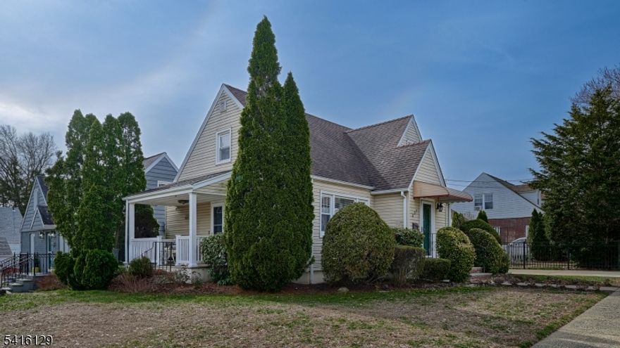 A true gem awaits at 337 Madison Ave in Clifton! This charming and meticulously maintained Cape offers fabulous curb appeal and a warm, inviting feel from the moment you arrive. The flexible floor plan features 2 bedrooms with the potential for a 3rd and 2 full baths.  The main level welcomes you with a bright living room flowing into a dining room with elegant French doors, which can easily serve as a third bedroom if desired. A beautifully renovated modern full bath, comfortable main-floor bedroom, and eat-in kitchen with access to a charming covered side porch complete this level perfect for morning coffee or relaxing evenings. Upstairs boasts a spacious primary bedroom suite with a full bath, abundant closet space, and walk-in attic storage. The finished tiled basement expands the living space with a large recreation room, office area, laundry room, storage, and Bilco doors providing direct access to the yard. Outside, enjoy a meticulously landscaped, fully fenced yard with a paver patio, ideal for outdoor dining and entertaining. Additional highlights include hardwood floors on the main level, updated windows, newer furnace and central air (2022), hot water heater (2019), roof (2012), a 1-car garage, and private driveway. Conveniently located near NYC transit, major highways, shopping, and parks. Don't miss your chance to call this Clifton charmer home!