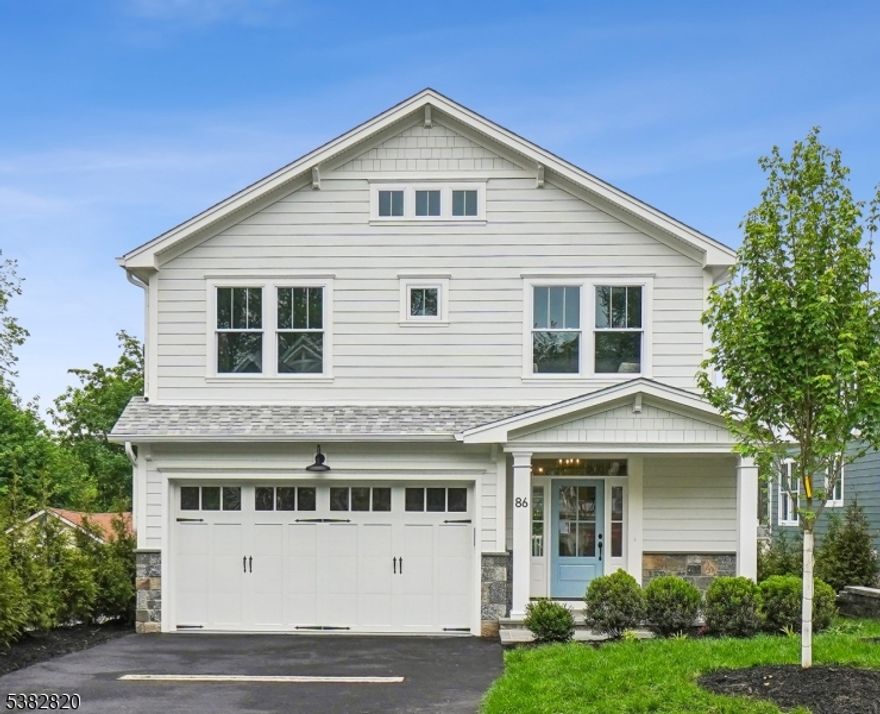 Welcome to 86 Ashwood Ave. The last available home in a newly developed subdivision.  A 100% BRAND NEW Craftsman Colonial that checks all the boxes. Great exterior architectural style with a rocking chair front porch. 2-car attached garage with EV charging port. The walk-out basement has 9' high ceilings & designed with full size windows & patio doors. The interior design is exciting and features a modern kitchen with Thermador professional series appliances, quartz tops, a wine bar and a full pantry closet. High ceilings and tall windows bring in abundant natural light. Wide plank white oak floors. Large second floor laundry room. Multi-zone HVAC. Security system. Full attic storage with plywood floors. Multi-zone lawn irrigation system and much more. Please note: 86 Ashwood is NOT a renovation. Instead, it conveys all the benefits of a newly built home with the assurance of a new home warranty plan. Developed by award-winning Menza & Beissel, with a 34 year track record.