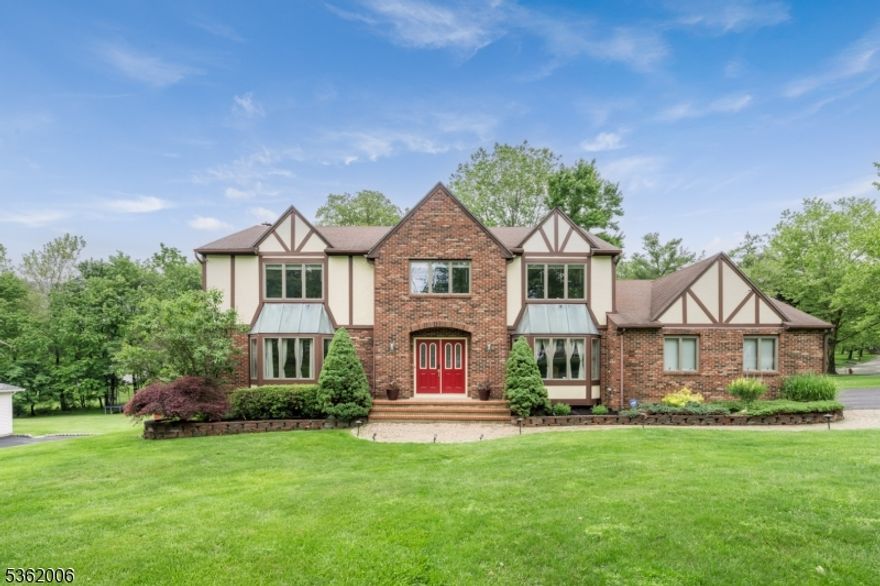 UPDATED & SPACIOUS TUDOR CENTER-HALL COLONIAL IN PRIME RANDOLPH NEIGHBORHOOD CLOSE TO Y, CCM, RTE 10! With fresh paint & attention to detail, 5 Mariner Drive presents an entertainer's dream with 5 Bedrooms, large unfinished Lower Level with great potential & over .5-acre lot with incredible deck & above-ground pool! Hardwood floors, windows everywhere, enhanced millwork, wood-burning fireplace, oversized rooms, closets & spa-like bathrooms make modern suburban living a pleasure. First Level boasts Living & Dining Rooms with matching bay windows drawing in tons of natural light & views of the landscaped yard & quiet street. Spacious Eat-in Kitchen features center island, stainless steel appliances, granite countertops, stone backsplash, plenty of cabinet storage & sliding doors to glorious two-tiered wood deck with dining space plus spots to relax around the pool. Step into the Family Room from the deck or Kitchen to enjoy movie night or a cozy fire. First Floor Laundry, Home Office/5th Bedroom & Powder Room complete this level. Up a gorgeous hardwood staircase with iron balusters, the Second Level offers more room to relax with 4 great-sized Bedrooms including Primary Ensuite with massive walk-in closet & bathroom with two sinks, modern soaking tub, walk-in shower & high-end design elements. Neighborhood offers social events & the YMCA is only blocks away. Randolph is known for excellent schools, beautiful parks & strong community. Make it your home today!