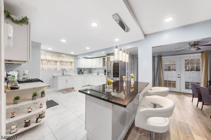 Welcome to contemporary living in the heart of Weequahic! This outstanding single-family home has been renovated throughout. Featuring a spacious and functional layout with three generous bedrooms and three-and-a-half bathrooms, an elegant and stylish kitchen with an island that is perfect for entertaining. This residence is designed for comfortable living and has ample space for gatherings. Located in a vibrant community near historic Weequahic Park with easy access to major commuter routes I-78, Route 22, and the Garden State Parkway. Just minutes from Liberty International Airport. Don't miss this rare opportunity to own a move-in ready masterpiece!