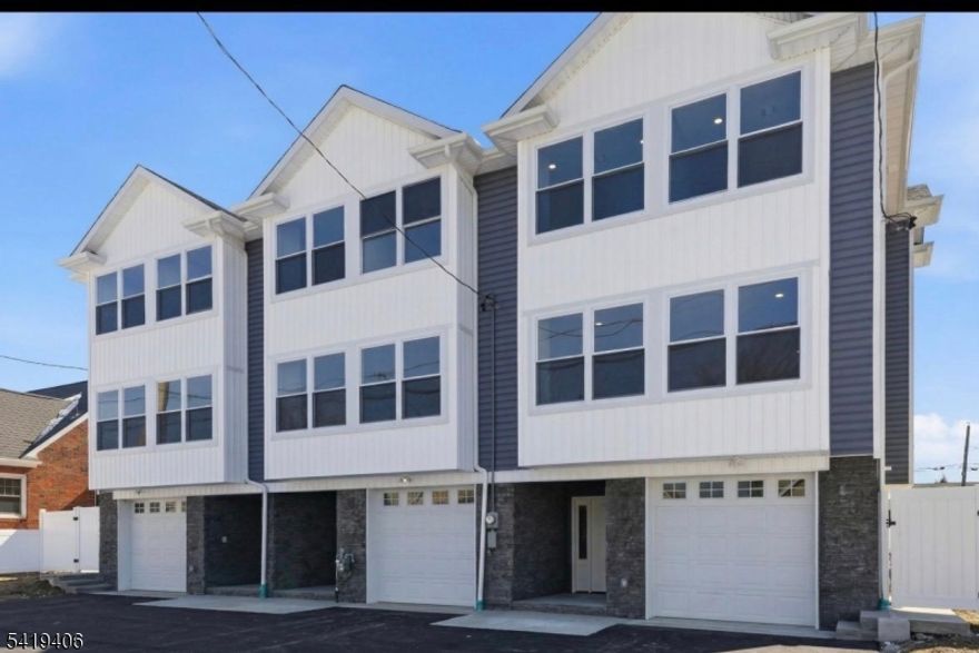 I am excited to share a new townhome project in this lovely community. Welcome home to a space that offers the best of everything. This townhome features an indoor garage for convenient, dry access on rainy days, along with a bonus room, a bathroom, and extra closet space. These homes are designed with the open floor plan buyers desire, complemented by high-end wood flooring that showcases exceptional craftsmanship. Two Zoned HVAC ground floor and 1st floor on one zone and top floor and 2nd zone. The kitchen is beautifully appointed with top-of-the-line GE Cafe appliances and stunning pendant lights over the island. The bathrooms are equally impressive, featuring elegant sliding doors and mirrors with built-in lighting. Throughout the home, you will find ample recessed lighting. The home offers a generous private balcony. Every detail has been considered, including both indoor and outdoor parking and plentiful closet space on every floor.This model includes three bedrooms, with the primary suite featuring a private bath. For added convenience, the laundry is located on the same floor as the bedrooms, checking off every item on your wishlist. The surrounding area offers a premier lifestyle with excellent cafes, shops, and restaurants. With convenient access to two train lines and local summer festivals, this community provides the very best of small-town living.