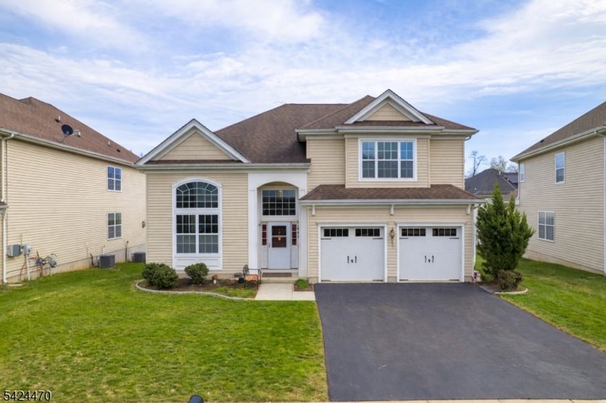 Stunning 4-bedroom, 2.5-bath home in the highly sought-after Heritage at Piscataway! This sun-filled home features a spacious open layout, large living room, formal dining, and a cozy family room with fireplace perfect for entertaining. Updated kitchen with stainless steel appliances. Main level offers a generously sized bedroom with en-suite bath and closet ideal for guests. Upstairs features 3 spacious bedrooms with ample closet space and a full bath. Bathrooms include soaking tubs and showers. North-facing and located in a quiet, desirable neighborhood. Close to shopping, major highways, schools, Rutgers University, and multiple train stations perfect for commuters.