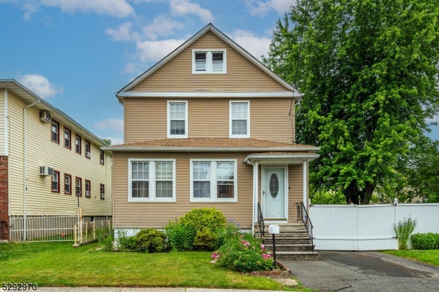 Welcome to this inviting Colonial home that beautifully blends classic elegance with modern comforts. The main level features a spacious living room perfect for gatherings, a formal dining room, and an eat-in kitchen with ample space for casual dining. Additionally, there is a convenient powder room on this level. Upstairs, the second floor offers three comfortable bedrooms and a full bathroom, providing plenty of space. The unfinished attic presents unlimited possibilities, ready for you to customize into additional living space, a home office, or a studio. The partially finished basement includes a cozy family room for relaxation, a dedicated laundry room, and a workshop for all your DIY projects. Outside, you'll find a spacious fenced-in yard with beautiful fruit trees, perfect for outdoor activities and gardening. The home also boasts a newer roof and newer siding, ensuring peace of mind for years to come. Ideally located few blocks from the train and bus with direct access to NY. This charming Colonial home is ready to welcome you with its perfect blend of character and modern updates. Don't miss out on the opportunity to make it yours. Schedule a showing today!