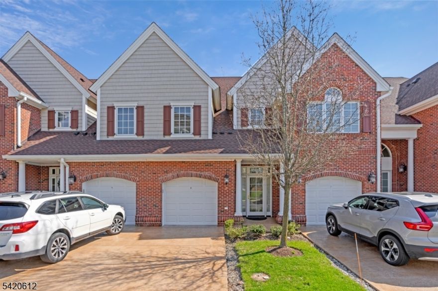 Rare opportunity to own in sought-after Lakeside Villas, a premier 55+ community just moments from Watchung Lake Park. Located in the newest building and originally offered as the model home, this beautifully maintained residence offers the perfect blend of comfort, convenience, and low-maintenance living. Designed for easy one-floor living, the main level features an open, light-filled layout with white oak hardwood floors, recessed lighting, and elegant trim and finishes. The spacious living and dining areas flow seamlessly, while the kitchen offers granite countertops, a breakfast bar, and quality stainless steel appliances. The primary bedroom is on the main level with a walk-in closet and en-suite bath. Inviting entry foyer with powder room,  laundry, and direct garage access add everyday ease plus no steps from entry. The finished walkout lower level provides excellent additional living space with a large family room, second bedroom, walk-in closet and full bath, along with access to a private patio perfect for relaxing or entertaining. Enjoy a peaceful lifestyle close to shopping, dining, and I-78 & Rt 22 highways, with scenic walking paths and the beauty of Watchung Lake just up the block.