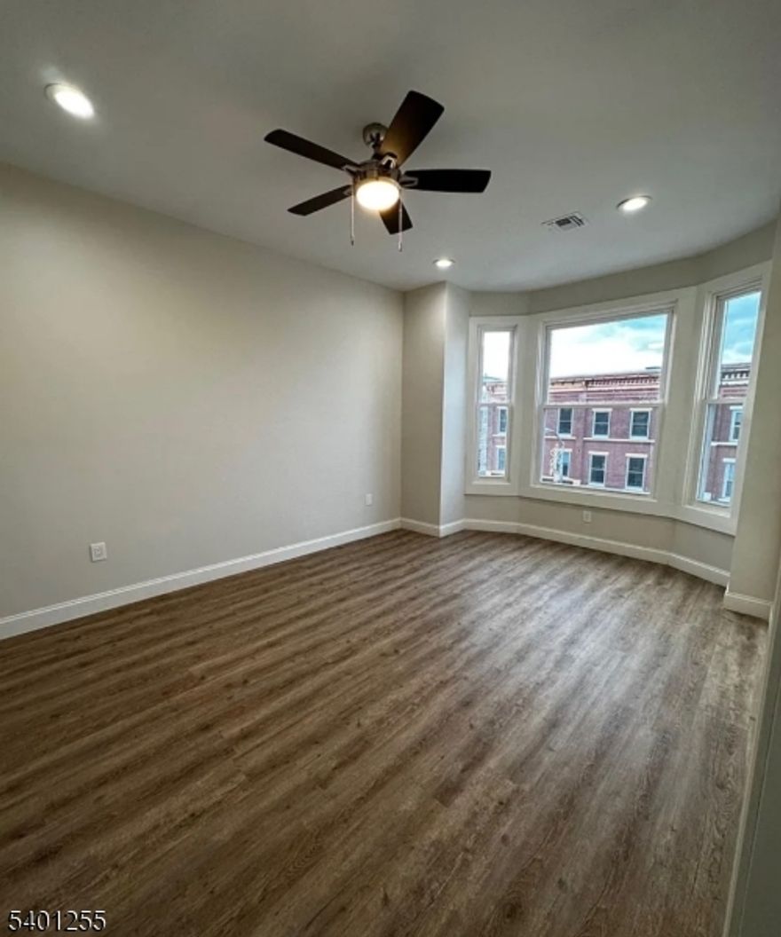 Beautiful renovated 2 Bedroom apartment for rent in the heart of Downtown Westfield! LVP flooring, kitchen with quartz countertops and stainless steel appliances. Open & bright living room with large windows overlooking downtown. Beautifully re-done bathroom with walk in shower. Washer/dryer in unit!! Walk to train and all downtown has to offer. No pets.