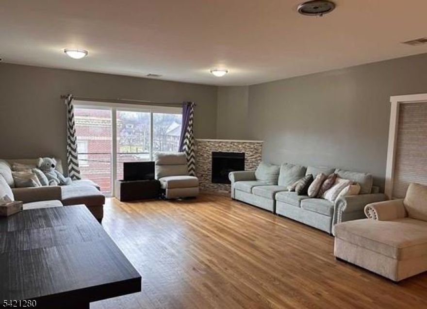 Beautiful 3-bedroom, 2-bath half duplex with a bright, spacious layout. Features a primary suite with a large closet and private ensuite bath, plus a one-car garage with extra storage. Prime commuter location with easy access to NYC, transportation, shopping, and major highways. Won't last schedule your showing today. Unit #2 (upper left, upstairs) is the ONLY unit for sale.